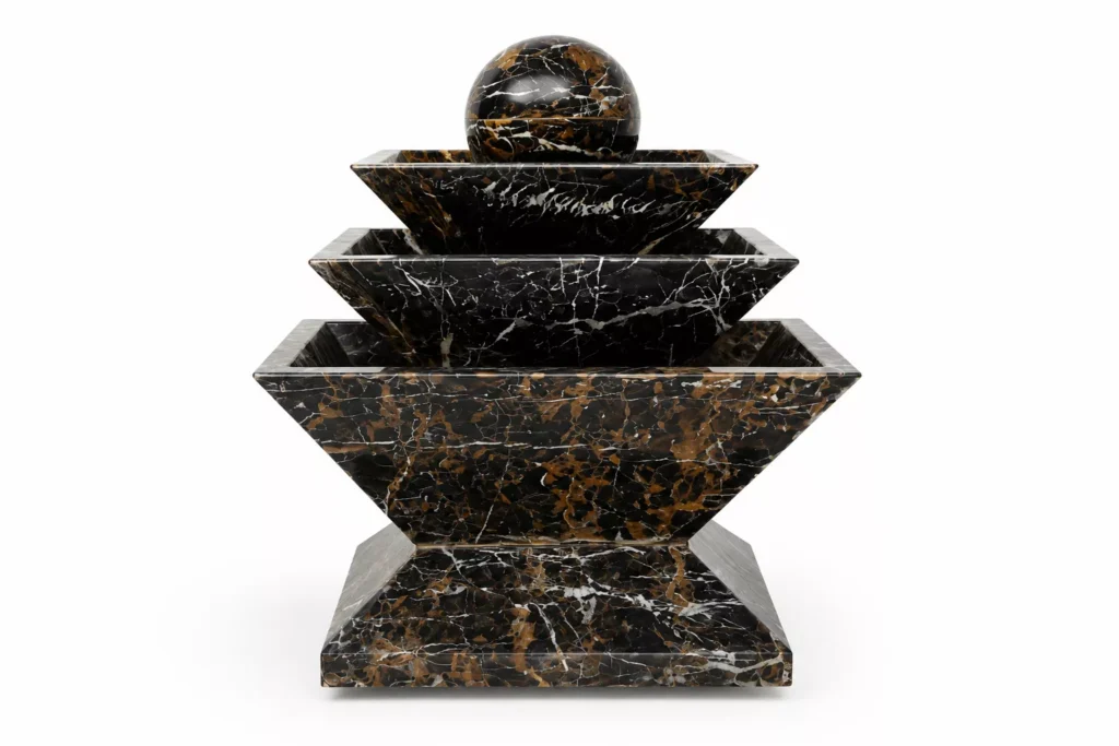 Black & Gold Marble Fountain handcrafted by Pakistan Marble & Onyx featuring a modern three-tier geometric design with a polished marble sphere for luxury gardens, villas, hotels, commercial landscapes, and worldwide export.