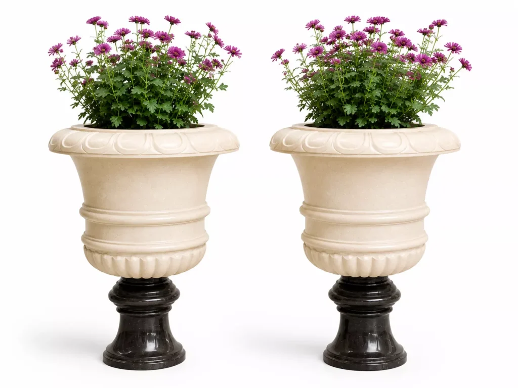 Luxury Cream Marble planter with Silky Black Marble pedestal handcrafted by Pakistan Marble & Onyx for hotels, villas, gardens, landscape projects, custom manufacturing, and worldwide export.
