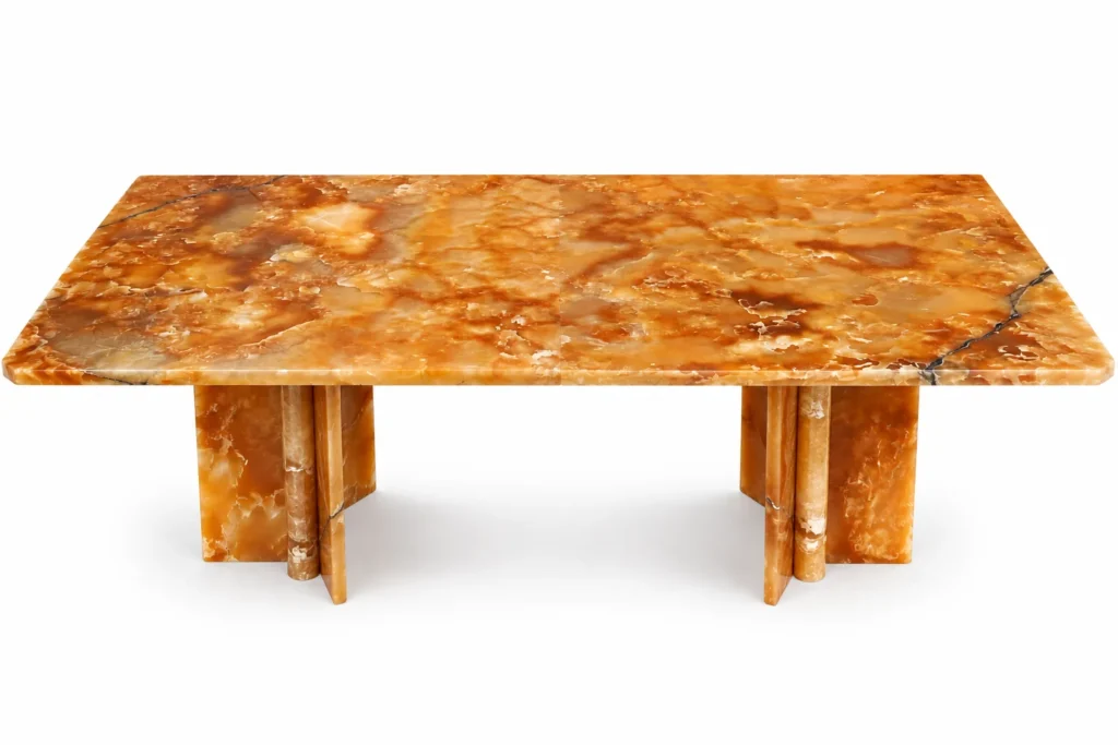 Handcrafted Honey Onyx dining table featuring warm golden veining and a contemporary architectural base made from premium natural onyx stone.