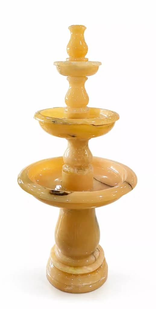Royal Honey Onyx Tiered Fountain handcrafted by Pakistan Marble & Onyx featuring a luxury three-tier cascading design in polished natural Honey Onyx for gardens, villas, hotels, courtyards, and worldwide export.