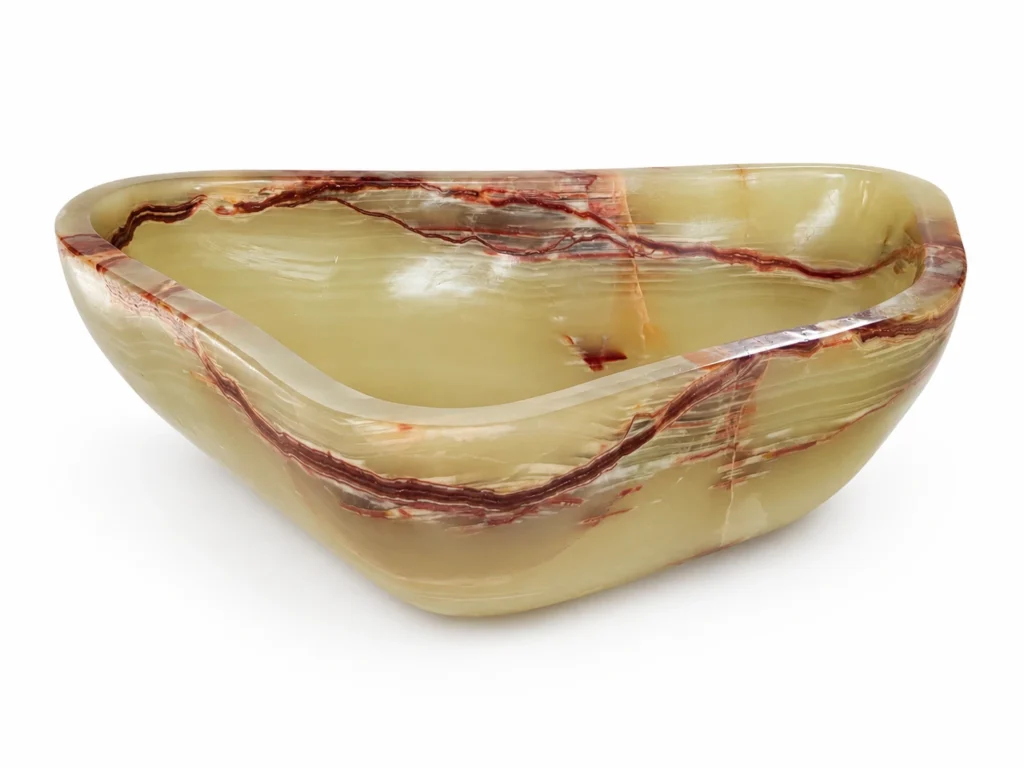 Sculpted green onyx vessel basin with dramatic burgundy natural veining by Pakistan Marble & Onyx