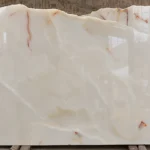 Afghan White Onyx slab with soft golden veining and high polish finish exported by Pakistan Marble and Onyx