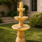 Honey Onyx fountain in a garden marble fountain