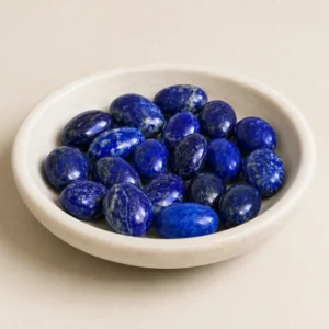 Natural polished lapis lazuli stone beads with unique blue tones and mineral patterns